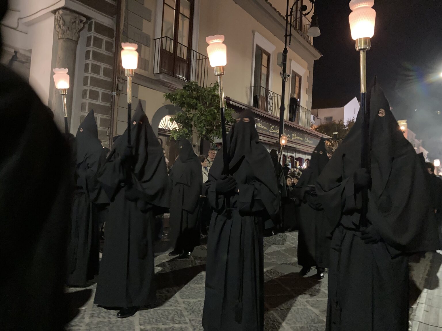 Sorrento Holy Week Processions 2025 black hooded men mypovsorrento Justine Gilbert About Sorrento